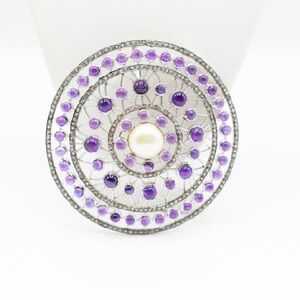 Large circular amethyst and diamonds pendent in Sterling silver .